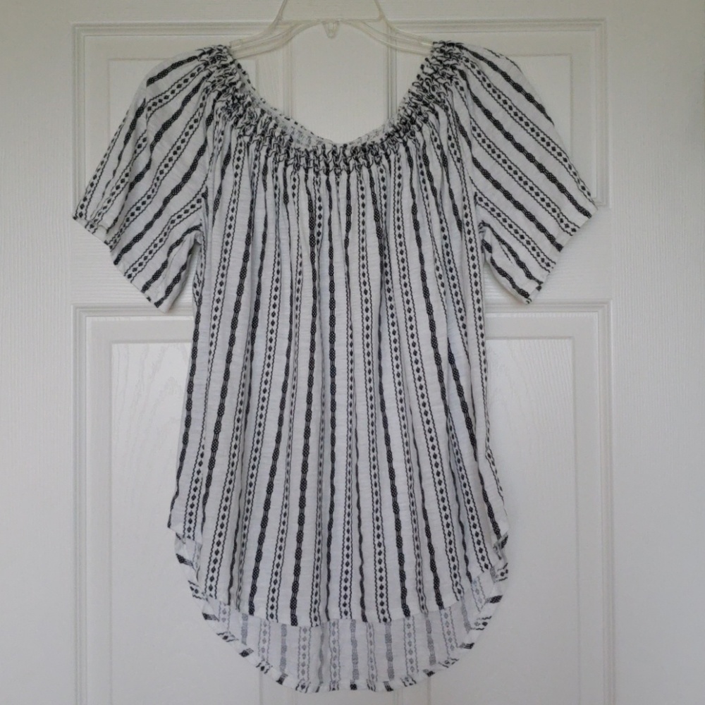 Off the shoulder short sleeve shirt.